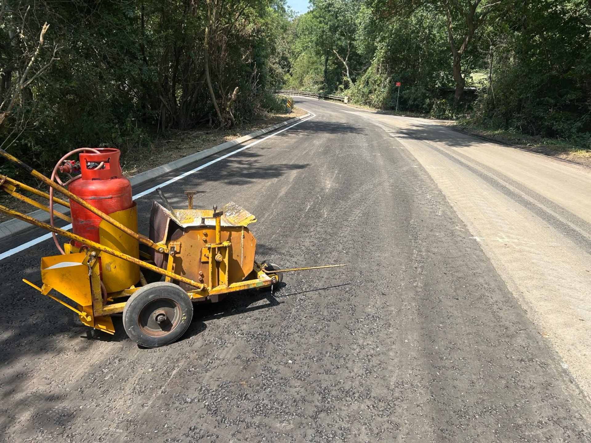 Broadmead Road, Bedfordshire — thermoplastic lining equipment on site