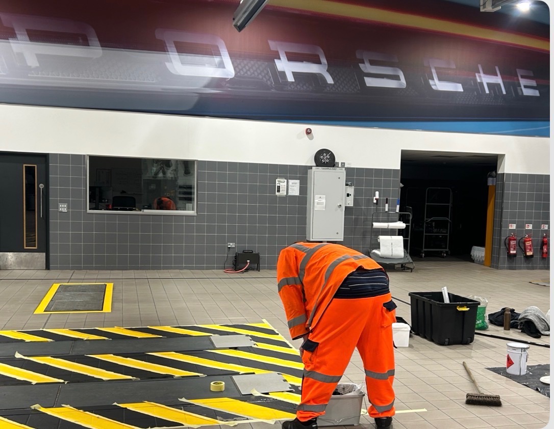 Porsche Norwich City — showroom floor lining