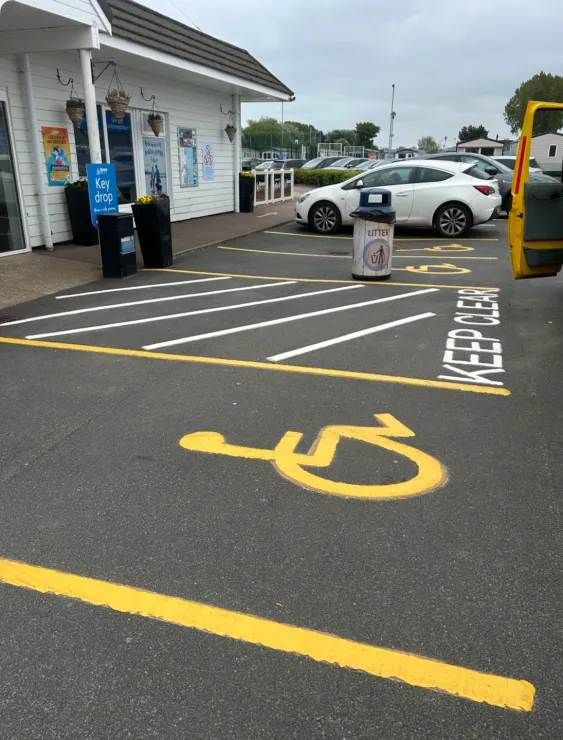 Disabled bay & KEEP CLEAR markings